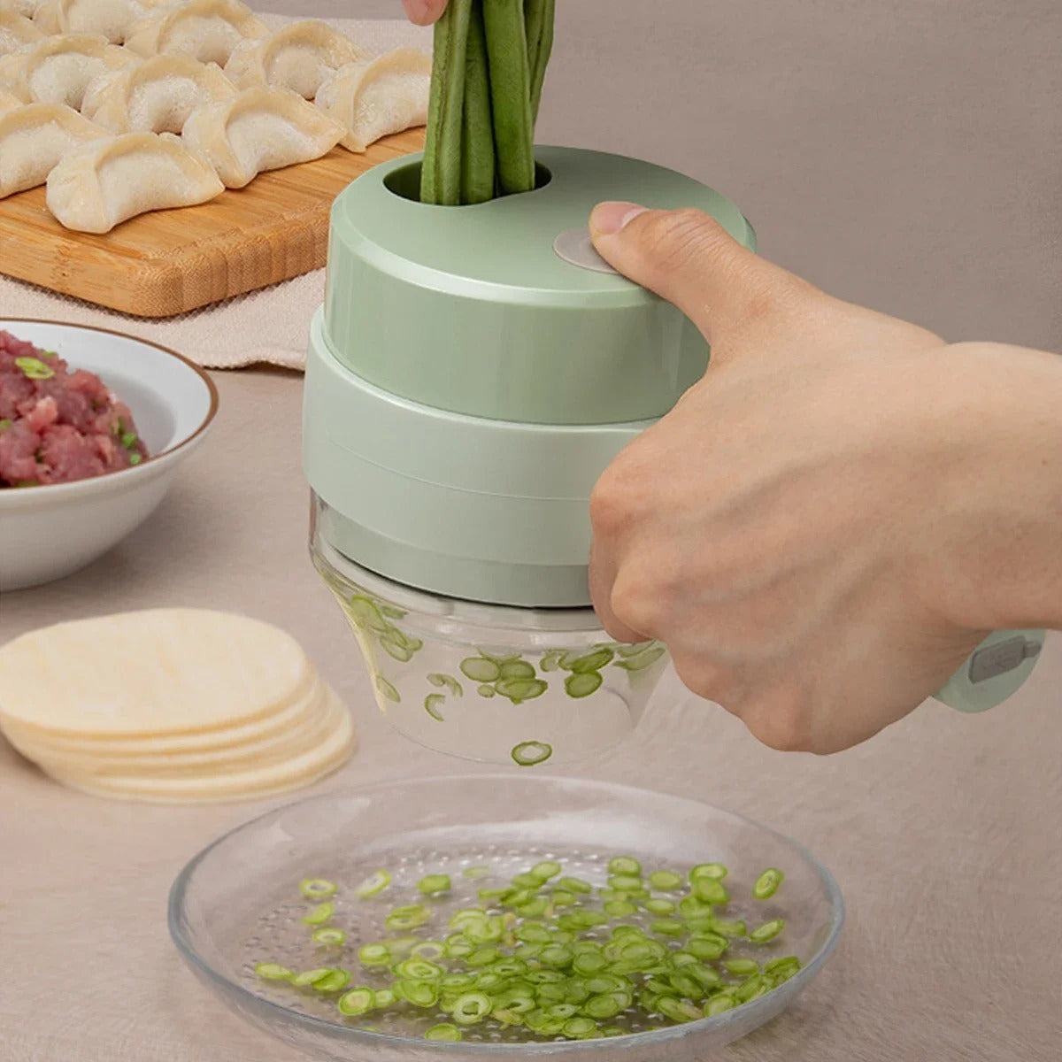 4 in 1 Wireless Electric Vegetable Cutter – Handheld Food Chopper, Garlic Crusher, Slicer and Peeler for Kitchen