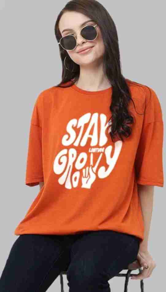 Stay Groovy Typography Printed Drop Shoulder Oversized T-Shirt for Women (Orange) – Trendy Half Sleeve Tee with Classic Round Neck, Soft & Breathable Cotton Blend Fabric for Comfort & Durability. Perfect for a Casual, Comfy, and Stylish Look!