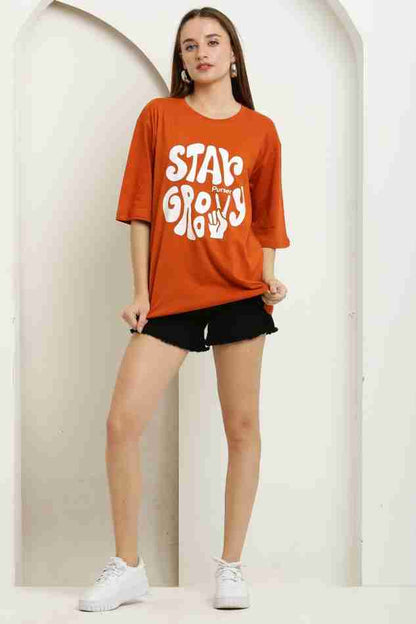 Stay Groovy Typography Printed Drop Shoulder Oversized T-Shirt for Women (Orange) – Trendy Half Sleeve Tee with Classic Round Neck, Soft & Breathable Cotton Blend Fabric for Comfort & Durability. Perfect for a Casual, Comfy, and Stylish Look!