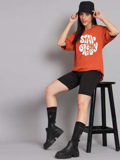 Stay Groovy Typography Printed Drop Shoulder Oversized T-Shirt for Women (Orange) – Trendy Half Sleeve Tee with Classic Round Neck, Soft & Breathable Cotton Blend Fabric for Comfort & Durability. Perfect for a Casual, Comfy, and Stylish Look!