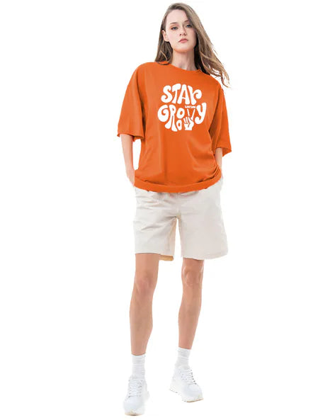 Stay Groovy Typography Printed Drop Shoulder Oversized T-Shirt for Women (Orange) – Trendy Half Sleeve Tee with Classic Round Neck, Soft & Breathable Cotton Blend Fabric for Comfort & Durability. Perfect for a Casual, Comfy, and Stylish Look!