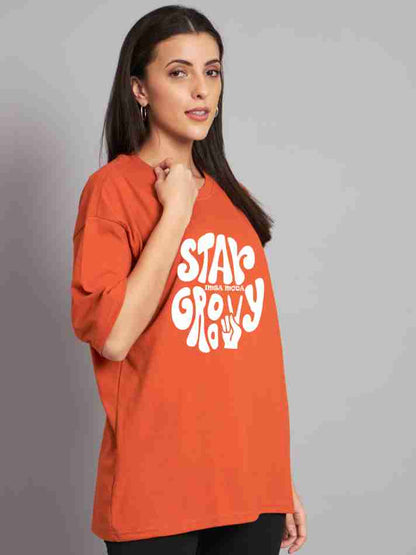Stay Groovy Typography Printed Drop Shoulder Oversized T-Shirt for Women (Orange) – Trendy Half Sleeve Tee with Classic Round Neck, Soft & Breathable Cotton Blend Fabric for Comfort & Durability. Perfect for a Casual, Comfy, and Stylish Look!